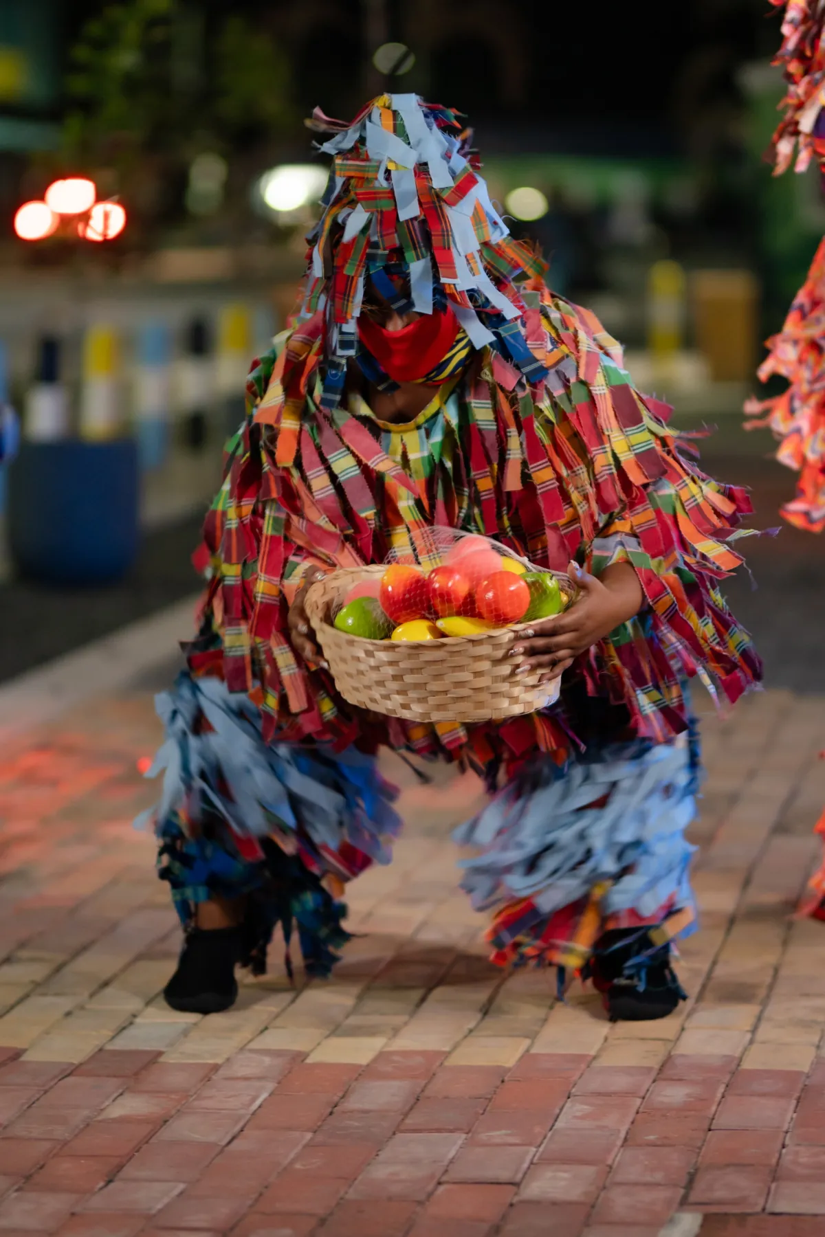 Caribbean Dance Masquerade performer in traditional costume
